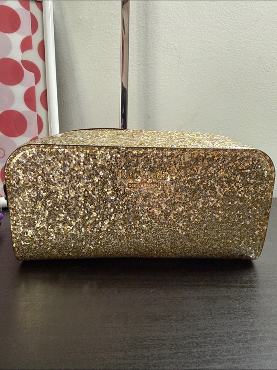 kate spade Handbags - kate spade gold glitter cosmetic pouch